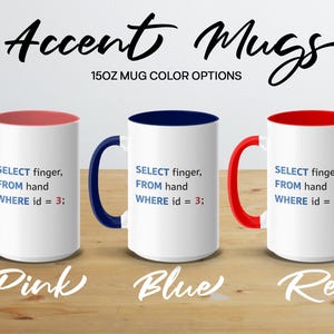 Three 15oz accent mugs in pink, blue, and red with coding text.