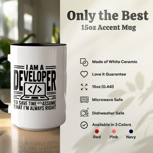 White ceramic mug with "I AM A DEVELOPER" text and red interior.