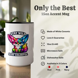 White ceramic mug with colorful fox art and "Stay Wild, Stay Colorful" text.