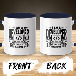 White mug with "I AM A DEVELOPER" and quote on front and back.