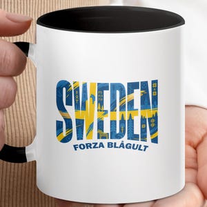 May include: A set of three ceramic mugs with a speckled, matte finish. The mugs are in shades of cream, light gray, and dark gray. Each mug has a simple, minimalist design, perfect for coffee or tea.