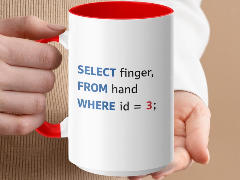 Mug with red handle showing SQL code: "SELECT finger, FROM hand WHERE id = 3;"