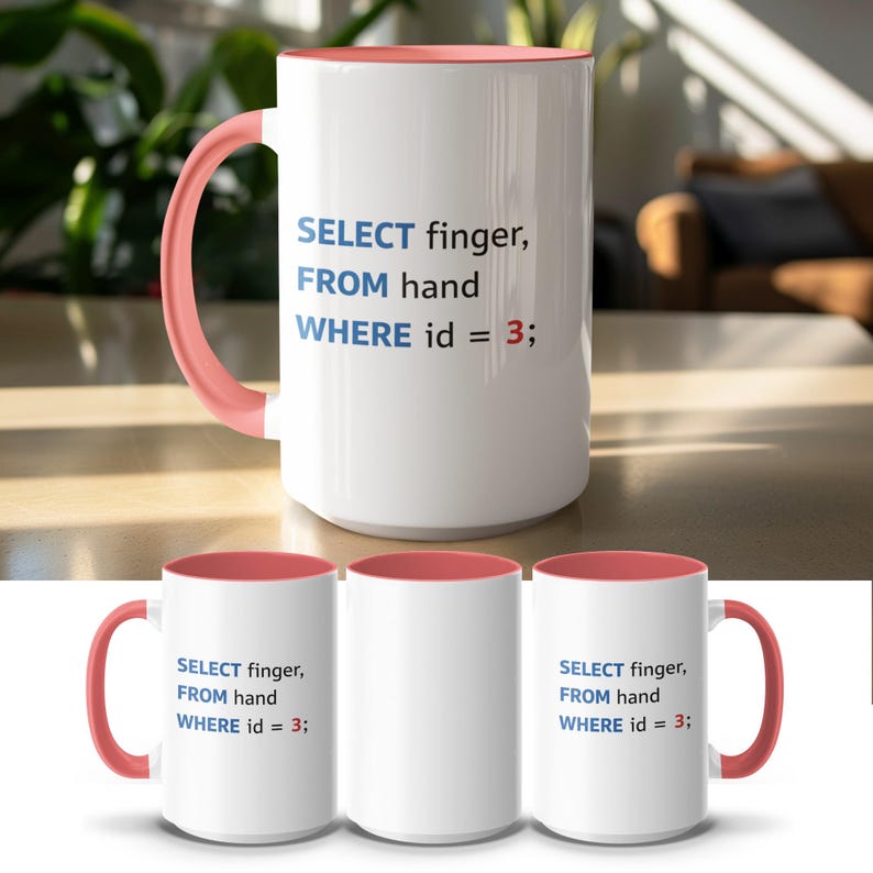 White mug with pink handle displaying "SELECT finger, FROM hand WHERE id = 3;".