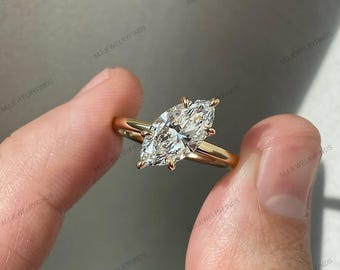 Anillo de moissanita marquesa de 1,50 ct, compromiso en plata de ley y oro rosa.