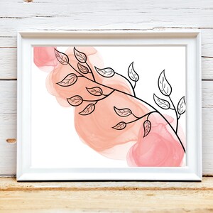 May include: A digital art print featuring a black line drawing of a branch with leaves against a background of abstract peach watercolor shapes.