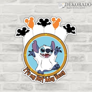 May include: A blue and white Stitch character dressed as a ghost with orange Mickey Mouse balloons and black bats. The text "It's my Birthday Vacay" is below the character.
