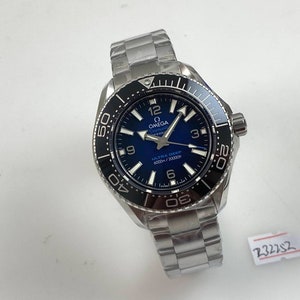 Seamaster Planet Ocean ULTRA PROFUNDO. 6000M 45,5 mm acero negro azul descolorido. Impresionante.