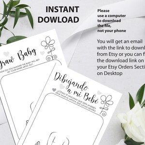 May include: Two printable baby shower game cards with instructions to draw a baby. The first card is in English and the second card is in Spanish. The cards feature a simple flower design.
