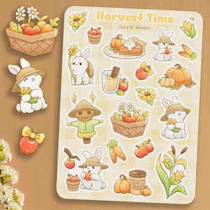 May include: A sheet of autumn-themed stickers featuring the text "Harvest Time" and illustrations of rabbits, pumpkins, apples, sunflowers, and a scarecrow. The stickers are in shades of orange, yellow, and brown, with a warm and inviting aesthetic.