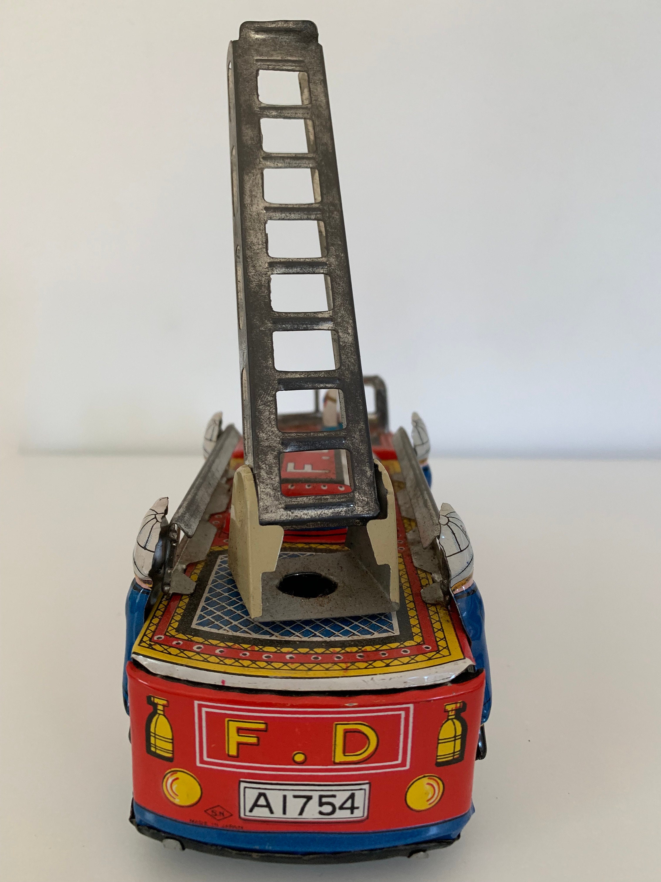 Rare Vintage Tin Lithograph F.D. Fire Engine Friction Toy