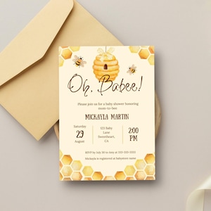 May include: A cream-colored baby shower invitation card featuring a watercolor beehive, two bees, and a honeycomb border. The text reads Oh, Babee!, Please join us for a baby shower honoring mom-to-bee, Mickayla Martin, Saturday August 29, 2:00 PM.