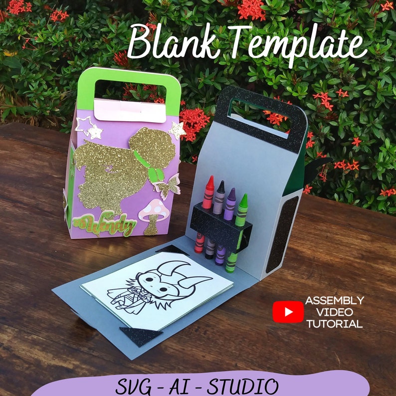 May include: A blank template for a favor box with a handle. The box is decorated with a purple background, gold glitter, and a butterfly. The box is open and shows a coloring page with a cartoon character and a set of crayons. The text "Blank Template" is at the top of the image. The text "SVG - AI - STUDIO" is at the bottom of the image. The text "ASSEMBLY VIDEO TUTORIAL" is in the lower right corner of the image.