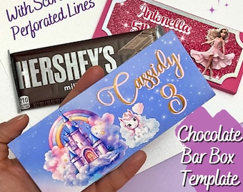 May include: A blue and pink chocolate bar box template with a unicorn and a castle design. The box is personalized with the name "Cassidy" and the number "8". The template includes score and perforated lines for easy assembly.