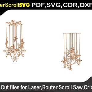 以下が含まれることがあります： レーザーカットされた木製の雪の結晶モビールのデザインが2つ。最初のデザインは、円形のベースに複数の雪の結晶がぶら下がっています。2番目のデザインは、長方形のベースに雪の結晶がぶら下がっています。
