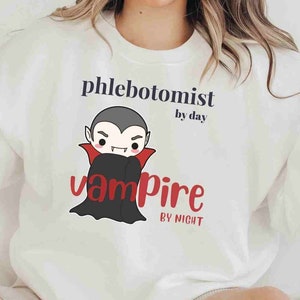 Phlebotomist by Day Vampire By Night Funny Halloween Sweatshirt, Medical Tech T-shirt, Gift for Phlebotomist, Fall Shirt Halloween Saying