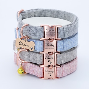 May include: Four dog collars in different colors, stacked on top of each other. The collars are made of a soft, tweed-like fabric. Each collar has a rose gold buckle with a personalized name tag. The names on the tags are Copper, Whiskey, Oliver, and Sunny. The top collar has a phone number and the words "microchipped" on the tag.