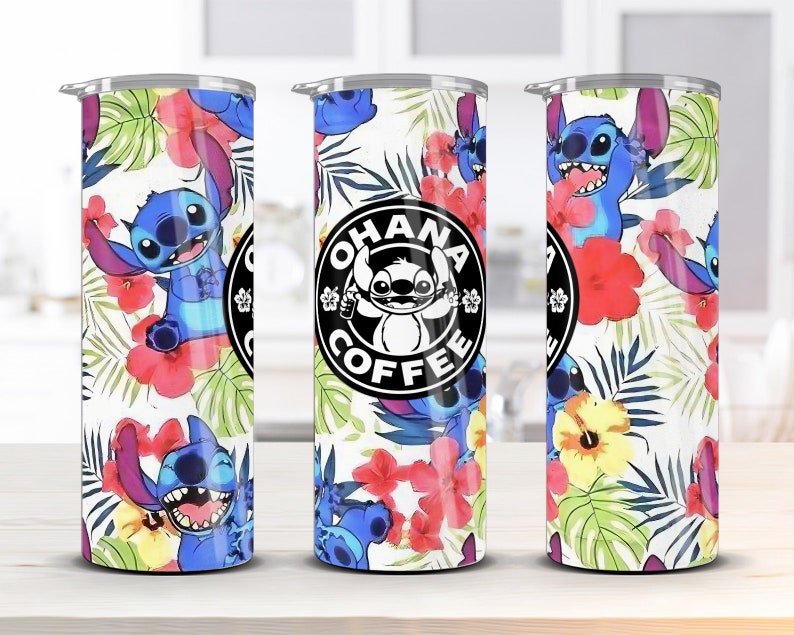 May include: Three stainless steel tumblers with a white background and a tropical floral pattern. The tumblers feature a cartoon character named Stitch from the Disney movie Lilo & Stitch. One tumbler has the text "Ohana Coffee" in a black circle.