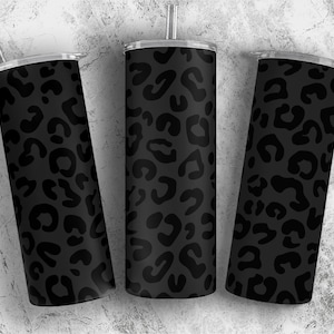 May include: Three black stainless steel tumblers with a black leopard print design.