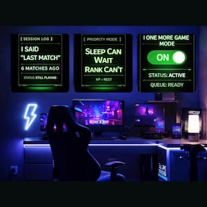 May include: A gaming setup with three illuminated displays showing game status and mode. The text on the displays reads "I Said Last Match", "Sleep Can Wait Rank Can't", and "One More Game Mode ON". A neon lightning bolt decorates the wall.