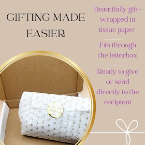 May include: A gift box with a white and gold polka dot wrapped package inside. The box is open, revealing the wrapped gift. Text on the image reads "GIFTING MADE EASIER" and "Beautifully gift-wrapped in tissue paper."
