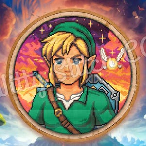 May include: A pixelated embroidery hoop featuring a character with blonde hair, a green tunic, and a green hat. The background is a sunset with a blue sky, birds, and trees. The character has a sword and a shield.