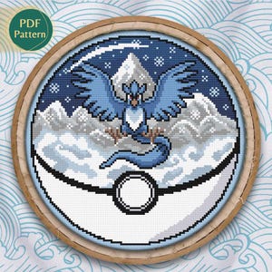 Schema punto croce tipo ghiaccio/volante, schema punto croce Pokeball Terrarium Articuno, uccelli leggendari, neve, montagne, schema PDF