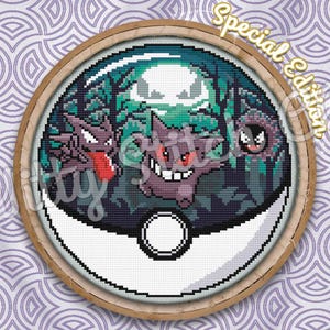 May include: A cross-stitch pattern featuring the Pokemon Ghost-type, Gengar, with its signature grin and purple and red coloring. The pattern also includes two other Ghost-type Pokemon, Haunter and Gastly, in the background. The pattern is framed in a wooden hoop and includes the text "Special Edition".