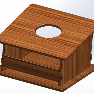 May include: Wooden stand with a circular cutout in the top and a shelf underneath. The stand is made of light brown wood with a wood grain pattern.