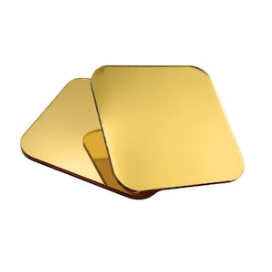May include: Two gold square acrylic coasters stacked on top of each other.
