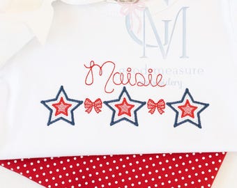 Ricamo a macchina con trio di stelle e fiocchi in raso