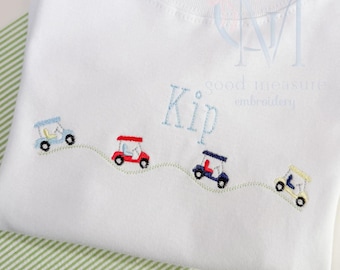 Carrelli da golf e disegno per ricamo a macchina verde