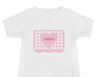 AMOR&Paz Valentine's Heart Candy Baby T-shirt with Pink Papel Picado Heart from the activity book FUN FIESTAS © by Lisa Osterman