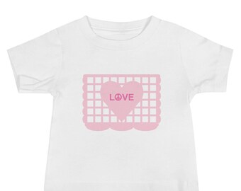 LOVE&Peace Valentine's Heart Candy Baby T-shirt with Pink Papel Picado Heart from the activity book FUN FIESTAS © by Lisa Osterman