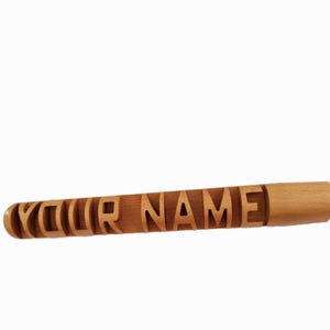 Personalised carved baseball bat