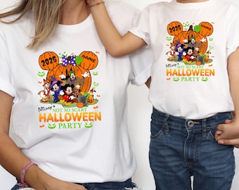 May include: White t-shirts with a Halloween-themed graphic. The design features Mickey Mouse and friends in front of a pumpkin, with the text "Mickey Not So Scary Halloween Party" and the year "2025".
