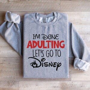 I'm Done Adulting Let's Go To Disney Sweatshirt, Disneyland Trip Hoodie, Adult Disneyworld Sweatshirt, Disney Gift Sweatshirt, Disney Hoodie Athletic Heather