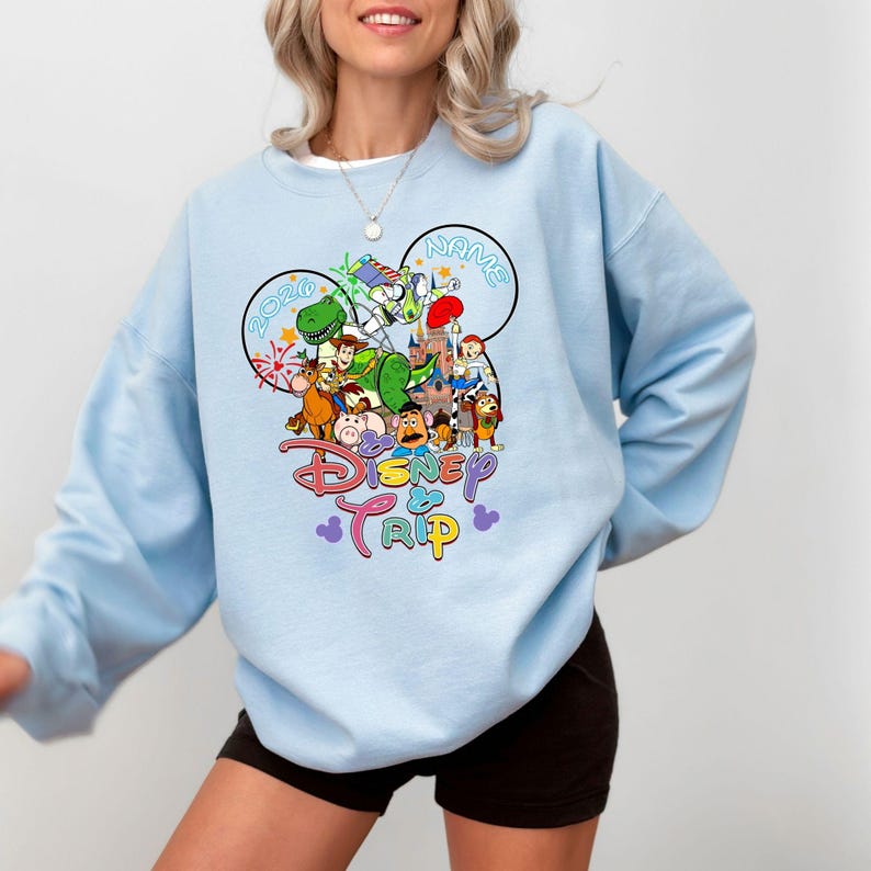 Personalized Toy Story Disney Trip Sweatshirt, Disney Trip 2026 Hoodie, Toy Story Family Matching Sweater, Toy Story Squad Sweatshirt Light Blue
