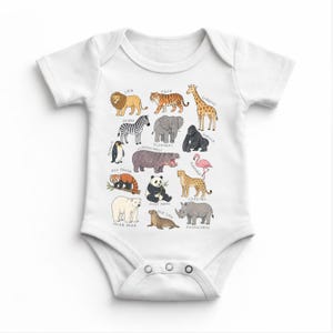 May include: White baby bodysuit featuring colorful illustrations of various animals, including a lion, tiger, giraffe, zebra, elephant, gorilla, penguin, red panda, polar bear, panda, sea lion, cheetah, and rhinoceros. The names of the animals are printed below each illustration.