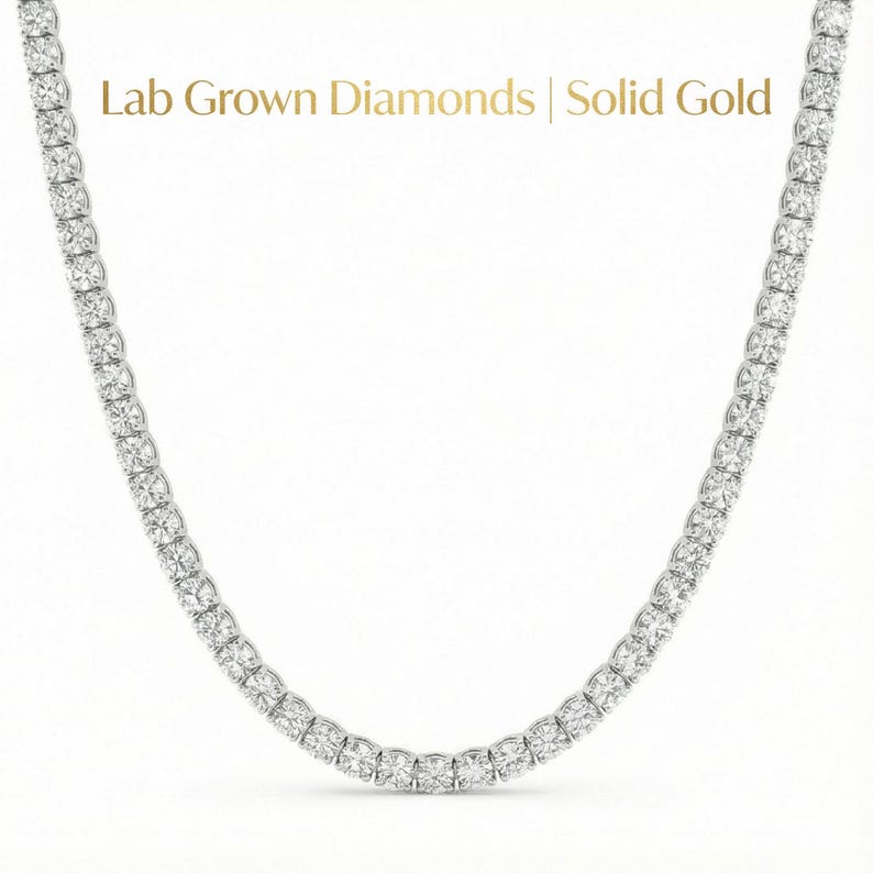 tennis necklace
sparkling necklace
engagement present
diamond chain
tennis chain
bridal necklace
diamond tennis
hip hop jewelry
tennis jewelry
Gold Tennis Necklace
Diamond Choker
Men Diamond Necklace
Lab Diamond Necklace