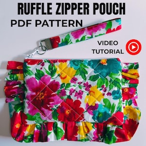 May include: A floral ruffle zipper pouch with a matching wrist strap. The pouch has a quilted design with a vibrant pattern of red, pink, yellow, and teal flowers on a white background. The text "RUFFLE ZIPPER POUCH PDF PATTERN" is displayed at the top.