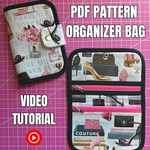 May include: A PDF pattern for an organizer bag with a video tutorial. The bag features a print with high heels, purses, and perfume bottles. The bag has a black trim and pink zippers.