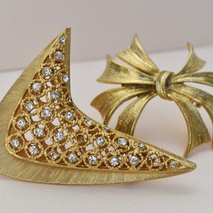 Vintage crystal brooch lot, large gold tone jewelry pins, crafting or wearable jewelry set, accent lapel brooches, accessory women