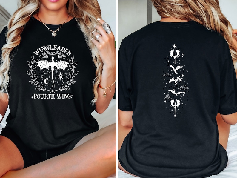 May include: Black t-shirt with a white graphic of a dragon and the text "WINGLEADER FOURTH WING". The back of the shirt has a vertical design of four dragons with stars and clouds.