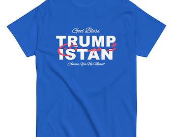 May include: A royal blue t-shirt with white text that reads "God Bless Trumpistan" with a red line through the word "Trump" and the text "Ameen Ya No Mean?" underneath.