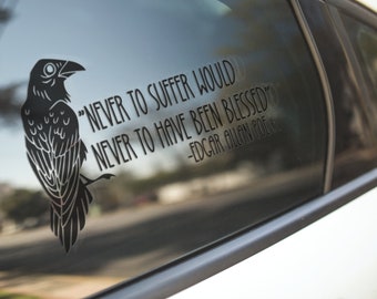 May include: A black and white car window sticker featuring a raven illustration and a quote by Edgar Allan Poe: "Never to suffer would never to have been blessed."