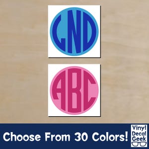 May include: Two monogram decals, one blue and one pink, each with three letters inside a circle. The blue decal has the letters "GND", and the pink decal has "ABC". The text "Choose From 30 Colors!" is at the bottom.