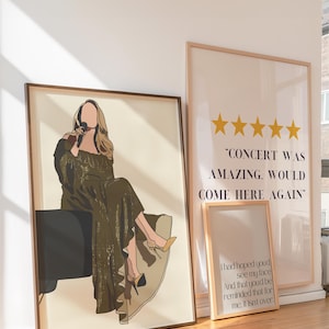 Puede incluir: Impresiones artísticas enmarcadas. Una presenta a una cantante con un vestido verde, sosteniendo un micrófono. Otra tiene el texto: "CONCERT WAS AMAZING. WOULD COME HERE AGAIN." Una tercera impresión tiene el texto: "I had hoped you'd see my face."