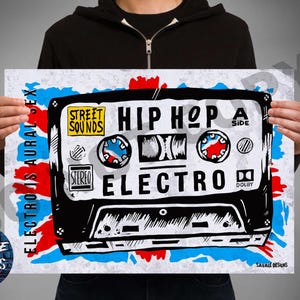 May include: A poster with a cassette tape design in black and white, with the words "HIP HOP ELECTRO" and "STREET SOUNDS." The design includes red and blue accents and the text "ELECTRO IS AURAL SEX."