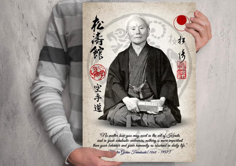 May include: A black and white photo of Gichin Funakoshi, the founder of modern karate, sitting in a traditional karate uniform. The image includes Japanese text that reads "松濤館空手道" (Shōtōkan Karate-dō) and "均馆" (Hongan). The quote below reads "No matter how you may excel in the art of Karate, and in your scholastic endeavors, nothing is more important than your behavior and your humanity as observed in daily life." - Gichin Funakoshi (1868 - 1957).