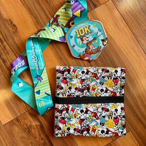 Medal Holder Pouch features Mickey & Friends, Medal Saver,Medal Protecter, Dopey Challenge, 5k, 10k, Half Marathon, Goofy’s Race, Run Disney